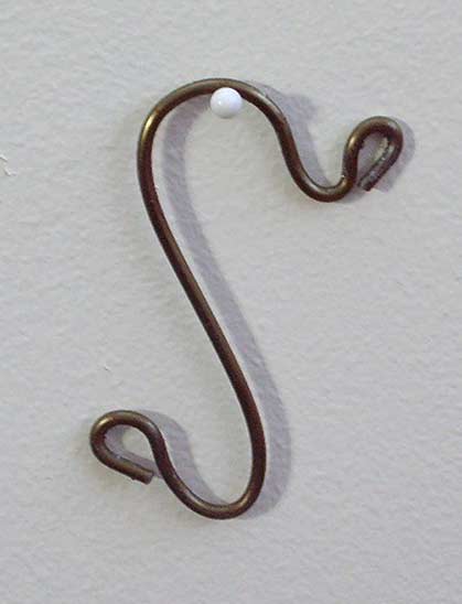 Joan Anderson useful scultpture with wire and found objects.