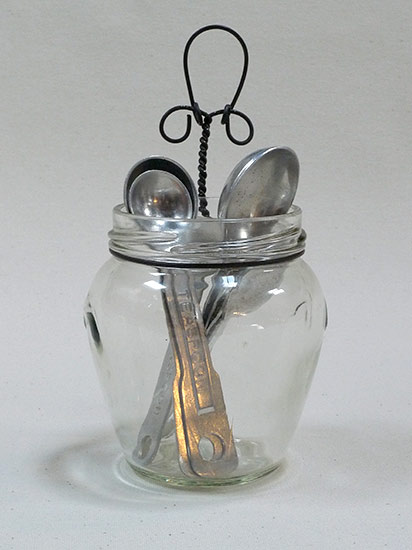 Joan Anderson useful scultpture with wire and found objects.