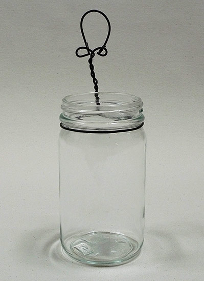 Joan Anderson useful scultpture with wire and found objects.