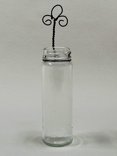 Joan Anderson useful scultpture with wire and found objects.