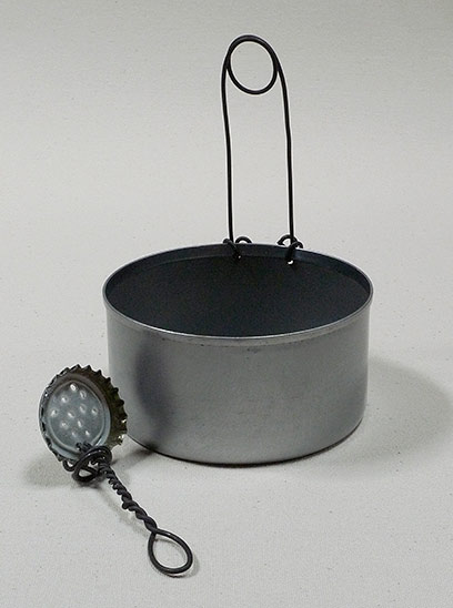 Joan Anderson useful scultpture with wire and found objects.