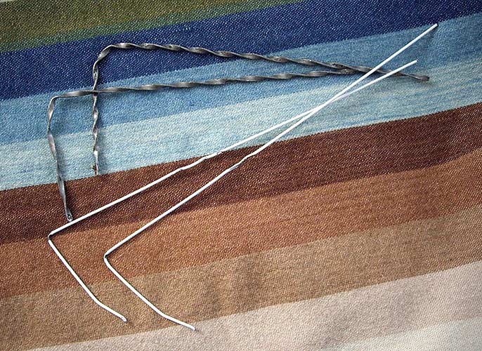 Joan Anderson useful scultpture with wire and found objects.