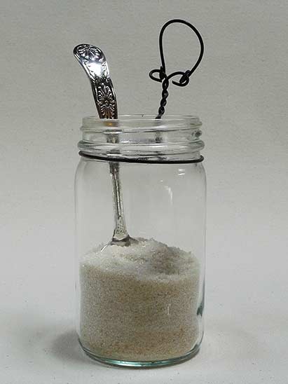 Joan Anderson useful scultpture with wire and found objects.