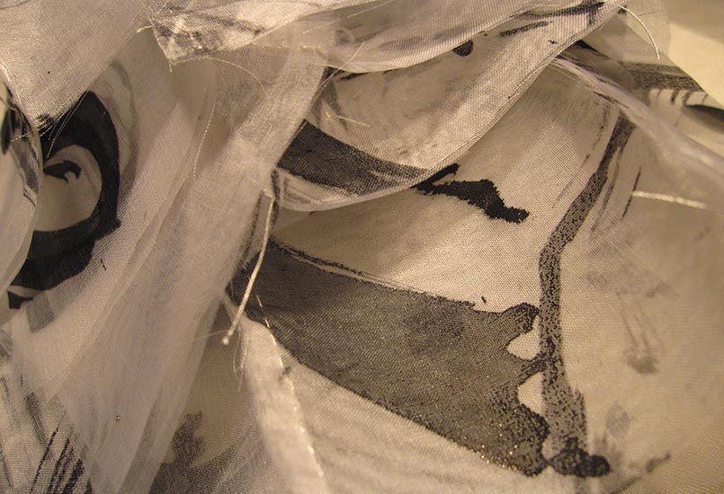 Joan Anderson and associates; painting on silk with found objects.