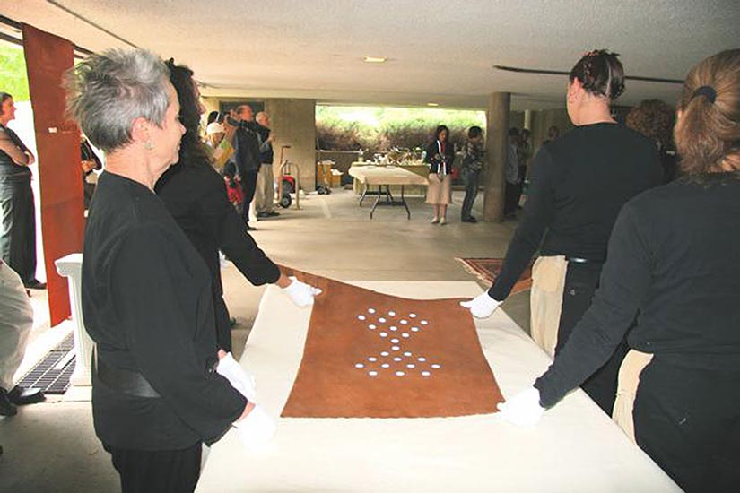 Photos of a performance installation called Something Between a Garment, a Being, and Skin.