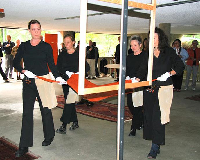 Photos of a performance installation called Something Between a Garment, a Being, and Skin.